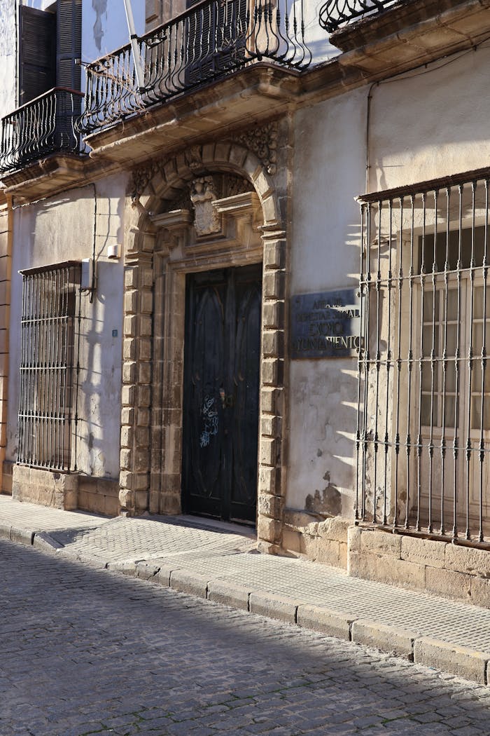 Charming historic building facade in El Puerto de Santa María, Andalucía, Spain, capturing timeless architecture.